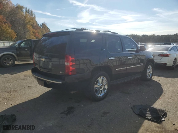 2010 Chevrolet Tahoe LTZ with VIN 1GNUCCE07AR207394, listed as a Copart auction lot 83867634 with 207,112 mi miles and Salvage Title. Bid and sale history available at carsss.com. Image 3.