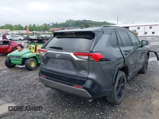 2021 Toyota RAV4 Hybrid XSE with VIN JTME6RFV0MD515817, listed as a IAAI auction lot 42127698 with 98,078 mi miles and . Bid and sale history available at DreamBid. Image 4.