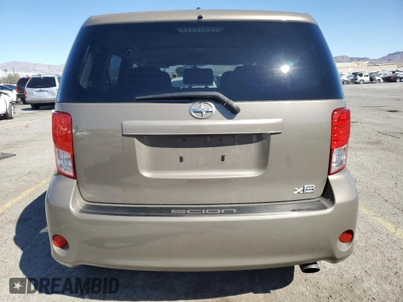 2012 Scion xB with VIN JTLZE4FE6CJ023059, listed as a Copart auction lot 49843555 with 145,371 mi miles and Salvage Title. Bid and sale history available at carsss.com. Image 6.