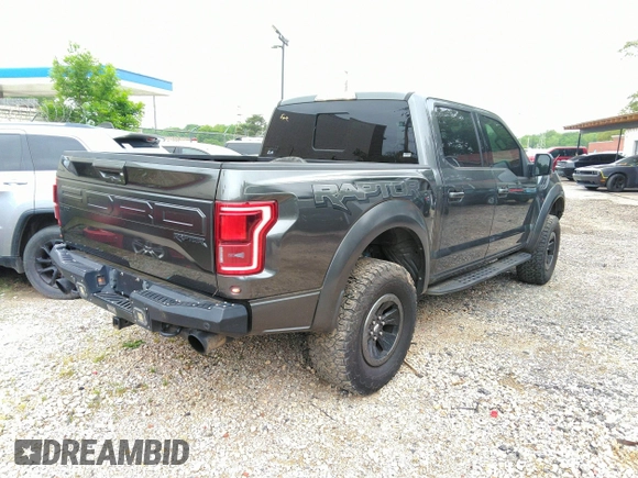 2017 Ford F-150 Raptor with VIN 1FTFW1RG8HFA31164, listed as a IAAI auction lot 42125542 with 164,745 mi miles and . Bid and sale history available at carsss.com. Image 4.