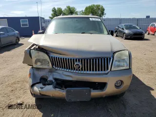 2005 Mercury Mountaineer Convenience z VIN 4M2DU86K65ZJ26504, wystawiony jako Copart lot #68130734 z przebiegiem 199 239 mil mil oraz Tytuł czysty. Historia ofert i sprzedaży dostępna na DreamBid. Obrazek 5.