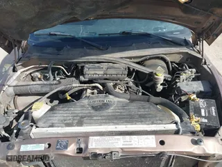 2001 Dodge Ram 1500 with VIN 1B7HC13Y51J543650, listed as a IAAI auction lot 41304978 with 217,255 mi miles. Bid and sale history available at carsss.com. Image 10.