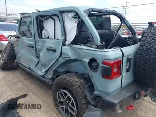 2024 Jeep Wrangler Rubicon with VIN 1C4PJXFG4RW266186, listed as a IAAI auction lot 42043265 with Not provided miles and . Bid and sale history available at DreamBid. Image 3.