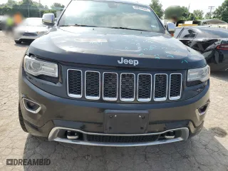 2014 Jeep Grand Cherokee Overland with VIN 1C4RJFCG6EC547604, listed as a Copart auction lot 55824944 with 128,330 mi miles and Clean Title. Bid and sale history available at carsss.com. Image 5.