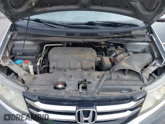 2016 Honda Odyssey EX-L z VIN 5FNRL5H6XGB084215, wystawiony jako IAAI lot #42381444 z przebiegiem 187 307 mil mil oraz . Historia ofert i sprzedaży dostępna na DreamBid. Obrazek 10.