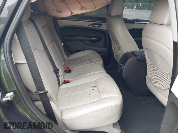 2015 Cadillac SRX with VIN 3GYFNAE30FS569009, listed as a IAAI auction lot 41718522 with 104,448 mi miles and . Bid and sale history available at DreamBid. Image 8.
