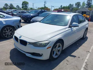 2013 BMW 3 Series 328i with VIN WBA3A5C55DF358287, listed as a IAAI auction lot 42027372 with 149,981 mi miles. Bid and sale history available at carsss.com. Image 2.