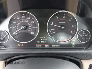 2014 BMW 3 Series 328d xDrive with VIN WBA3D5C50EKX96327, listed as a IAAI auction lot 42050971 with 163,785 mi miles. Bid and sale history available at carsss.com. Image 15.