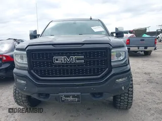 2017 GMC Sierra 1500 SLE z VIN 3GTU2MEC3HG358917, wystawiony jako IAAI lot #42033359 z przebiegiem 92 643 mil mil oraz . Historia ofert i sprzedaży dostępna na DreamBid. Obrazek 12.