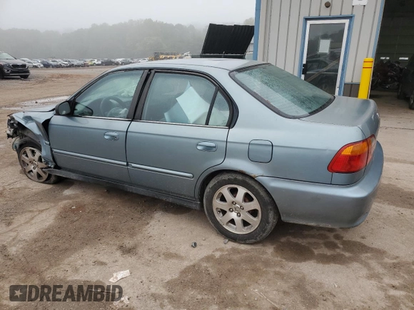 2000 Honda Civic VP with VIN 2HGEJ6612YH566224, listed as a Copart auction lot 74302284 with 197,203 mi miles and Salvage Title. Bid and sale history available at carsss.com. Image 2.