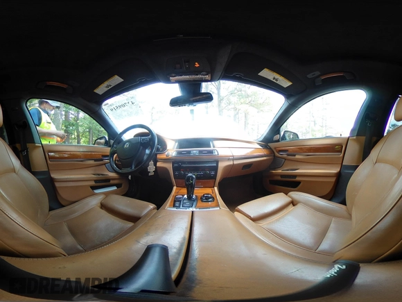 2013 BMW 7 Series 750Li with VIN WBAYE8C55DDS16013, listed as a IAAI auction lot 42709519 with 123,405 mi miles and . Bid and sale history available at DreamBid. Image 19.