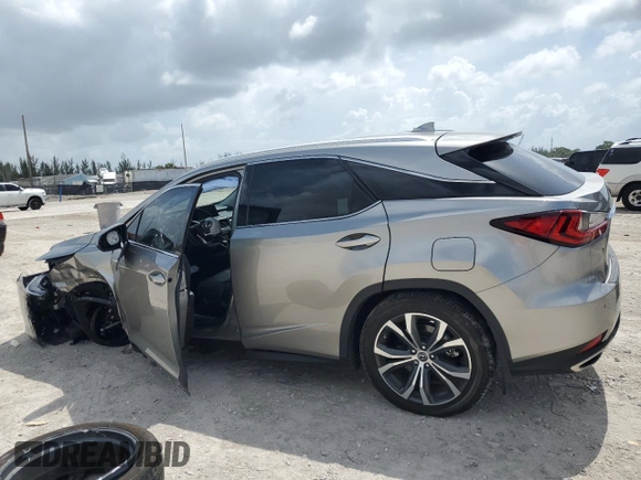 2022 Lexus RX 350 z VIN 2T2HZMAA9NC252992, wystawiony jako Copart lot #64631245 z przebiegiem 20 343 mil mil oraz Szkoda całkowita • Salvage title. Historia ofert i sprzedaży dostępna na DreamBid. Obrazek 2.