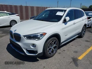 2017 BMW X1 xDrive28i with VIN WBXHT3C33H5F86831, listed as a IAAI auction lot 42019082 with 74,708 mi miles and . Bid and sale history available at DreamBid. Image 2.