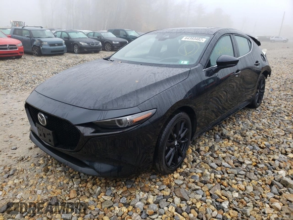 2021 Mazda Mazda3 Hatchback Premium with VIN JM1BPBML4M1402317, listed as a Copart auction lot 64393482 with 8,016 mi miles. Bid and sale history available at carsss.com. Image 2.
