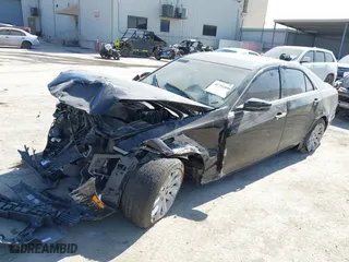 2016 Cadillac CTS Sedan RWD with VIN 1G6AP5SX5G0194397, listed as a IAAI auction lot 41791898 with 77,809 mi miles. Bid and sale history available at carsss.com. Image 2.