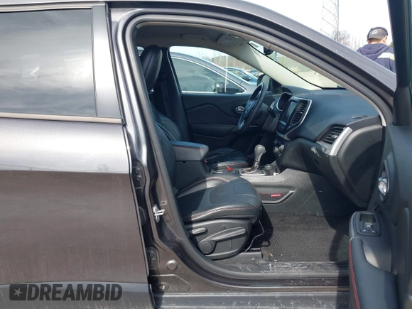 2015 Jeep Cherokee Trailhawk z VIN 1C4PJMBS3FW520328, wystawiony jako IAAI lot #41746017 z przebiegiem 83 485 mil mil oraz . Historia ofert i sprzedaży dostępna na DreamBid. Obrazek 5.