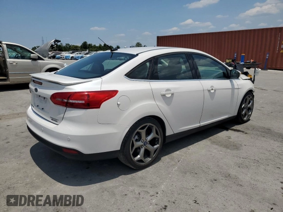 2015 Ford Focus Titanium с VIN 1FADP3J24FL304136, выставлен на аукционе Copart как лот 58428865 с пробегом 81 668 миль миль и Списание • Salvage title. История ставок и продаж доступна на DreamBid. Изображение 3.