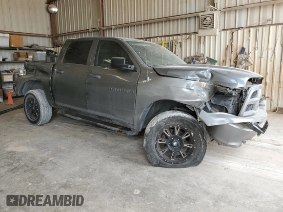 2012 Ram 1500 Tradesman with VIN 1C6RD7KP5CS241163, listed as a Copart auction lot 50246095 with 190,659 mi miles and Salvage title. Bid and sale history available at DreamBid. Image 4.