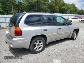 2004 GMC Envoy SLE with VIN 1GKDS13S942119615, listed as a Copart auction lot 69653494 with 141,856 mi miles and Salvage Title. Bid and sale history available at carsss.com. Image 3.