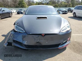 2019 Tesla Model S 100D с VIN 5YJSA1E42KF312803, выставлен на аукционе Copart как лот 71246484 с пробегом 89 820 миль миль и На запчасти • Non repairable. История ставок и продаж доступна на DreamBid. Изображение 5.