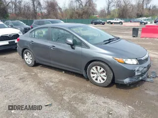 2012 Honda Civic LX z VIN 19XFB2F52CE389822, wystawiony jako IAAI lot #41960928 z przebiegiem 66 170 mil mil oraz . Historia ofert i sprzedaży dostępna na DreamBid. Obrazek 1.