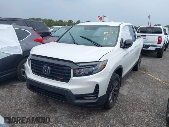 2023 Honda Ridgeline Sport z VIN 5FPYK3F14PB049364, wystawiony jako IAAI lot #40474507 z przebiegiem Nie podano mil oraz . Historia ofert i sprzedaży dostępna na DreamBid. Obrazek 2.