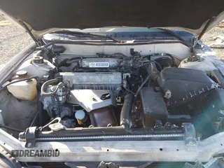 1995 Toyota Camry LE z VIN JT2SK12E5S0332027, wystawiony jako IAAI lot #42078977 z przebiegiem 128 929 mil mil oraz . Historia ofert i sprzedaży dostępna na DreamBid. Obrazek 10.
