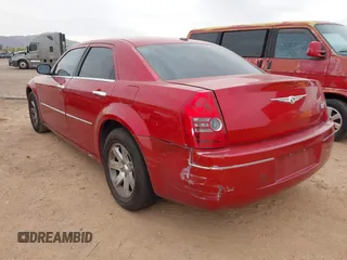 2010 Chrysler 300 Touring with VIN 2C3CA5CV3AH138812, listed as a IAAI auction lot 41870285 with 165,788 mi miles. Bid and sale history available at carsss.com. Image 3.