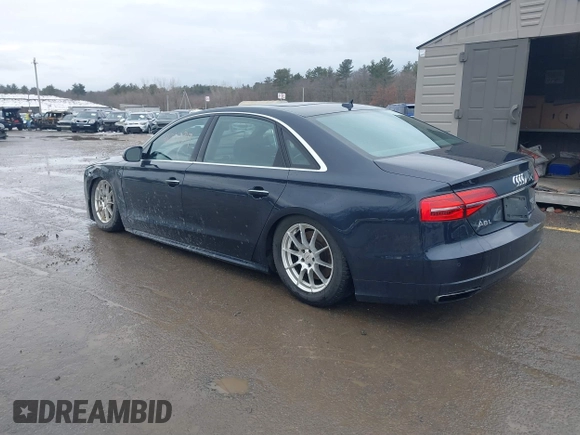 2017 Audi A8 L Sport with VIN WAU43AFDXHN003685, listed as a IAAI auction lot 41264314 with 114,828 mi miles. Bid and sale history available at carsss.com. Image 3.