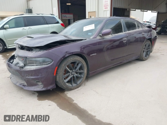 2022 Dodge Charger R/T with VIN 2C3CDXCT2NH167032, listed as a IAAI auction lot 40799785 with 24,817 mi miles and . Bid and sale history available at carsss.com. Image 17.