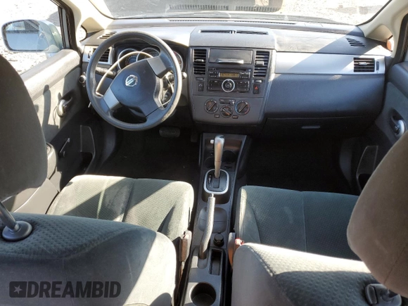 2010 Nissan Versa 1.8 S with VIN 3N1BC1CP9AL468234, listed as a Copart auction lot 52142665 with 127,396 mi miles and Salvage Title. Bid and sale history available at carsss.com. Image 8.