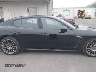 2016 Porsche Panamera 4 z VIN WP0AA2A72GL005752, wystawiony jako IAAI lot #41869840 z przebiegiem 114 719 mil mil oraz . Historia ofert i sprzedaży dostępna na DreamBid. Obrazek 13.