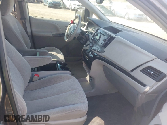 2014 Toyota Sienna LE AAS with VIN 5TDKK3DC0ES498732, listed as a IAAI auction lot 42077044 with 189,745 mi miles and . Bid and sale history available at carsss.com. Image 5.