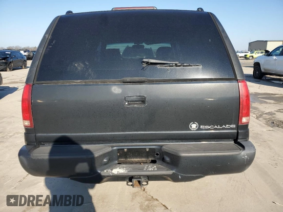 1999 Cadillac Escalade z VIN 1GYEK13R7XR402243, wystawiony jako Copart lot #43269935 z przebiegiem 231 465 mil mil oraz Czysty tytuł • Clean title. Historia ofert i sprzedaży dostępna na DreamBid. Obrazek 6.