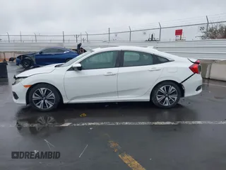 2016 Honda Civic Sedan EX-L with VIN 2HGFC1F78GH648639, listed as a IAAI auction lot 41895039 with 121,072 mi miles. Bid and sale history available at carsss.com. Image 14.