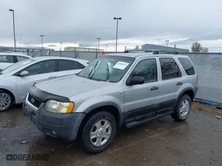 2002 Ford Escape Limited with VIN 1FMCU04152KA38640, listed as a IAAI auction lot 41895674 with 106,449 mi miles. Bid and sale history available at carsss.com. Image 2.