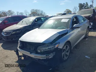 2018 Honda Accord EX-L z VIN 1HGCV2F57JA014214, wystawiony jako IAAI lot #41909287 z przebiegiem 81 388 mil mil oraz . Historia ofert i sprzedaży dostępna na DreamBid. Obrazek 2.