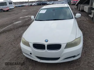 2010 BMW 3 Series 328i with VIN WBAPH7G51ANM52218, listed as a IAAI auction lot 41066937 with 129,932 mi miles and . Bid and sale history available at carsss.com. Image 6.