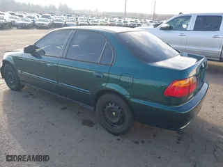 1999 Honda Civic VP with VIN 2HGEJ6617XH508270, listed as a IAAI auction lot 41319879 with 119,549 mi miles. Bid and sale history available at carsss.com. Image 3.