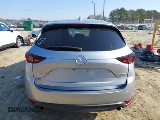 2020 Mazda CX-5 Touring with VIN JM3KFACM8L0727393, listed as a IAAI auction lot 41492627 with 91,521 mi miles. Bid and sale history available at carsss.com. Image 16.