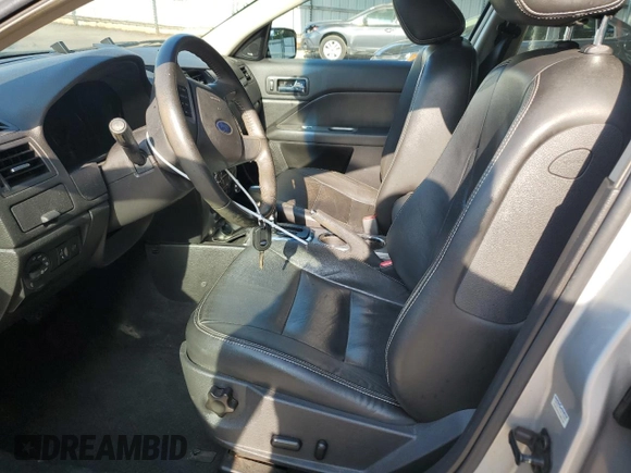 2010 Ford Fusion Hybrid with VIN 3FADP0L34AR178536, listed as a Copart auction lot 59860475 with 227,024 mi miles and Salvage title. Bid and sale history available at DreamBid. Image 7.