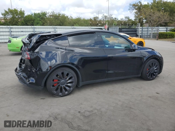 2023 Tesla Model Y Performance with VIN 7SAYGDEF8PF762915, listed as a Copart auction lot 50270285 with 23,893 mi miles and Salvage Title. Bid and sale history available at DreamBid. Image 3.