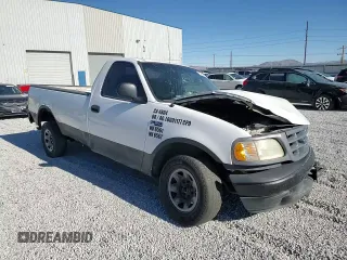 2000 Ford F-150 XL with VIN 2FTPF17Z5YCA99717, listed as a Copart auction lot 70658194 with Not provided miles and Salvage title. Bid and sale history available at DreamBid. Image 11.