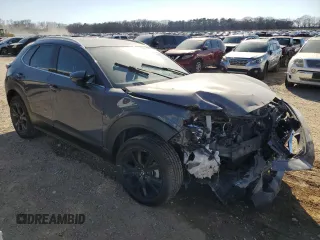 2021 Mazda CX-30 Premium with VIN 3MVDMBDY3MM262954, listed as a Copart auction lot 48798565 with Not provided miles and Salvage title. Bid and sale history available at DreamBid. Image 4.
