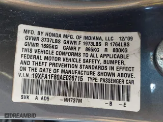 2010 Honda Civic Sdn EX with VIN 19XFA1F80AE026715, listed as a IAAI auction lot 41887154 with 128,272 mi miles. Bid and sale history available at carsss.com. Image 9.