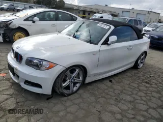 2011 BMW 1 Series 135i with VIN WBAUN7C56BVM25065, listed as a Copart auction lot 43022875 with 72,209 mi miles and Salvage Title. Bid and sale history available at DreamBid. Image 1.