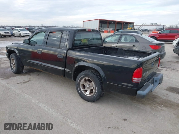 2004 Dodge Dakota Sport with VIN 1D7HL38N24S768283, listed as a IAAI auction lot 41635910 with 328,505 mi miles. Bid and sale history available at carsss.com. Image 3.