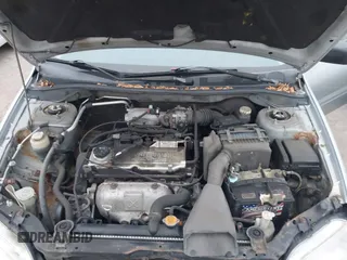 2002 Mitsubishi Lancer ES with VIN JA3AJ26E62U060214, listed as a IAAI auction lot 40961872 with 150,399 mi miles. Bid and sale history available at carsss.com. Image 10.