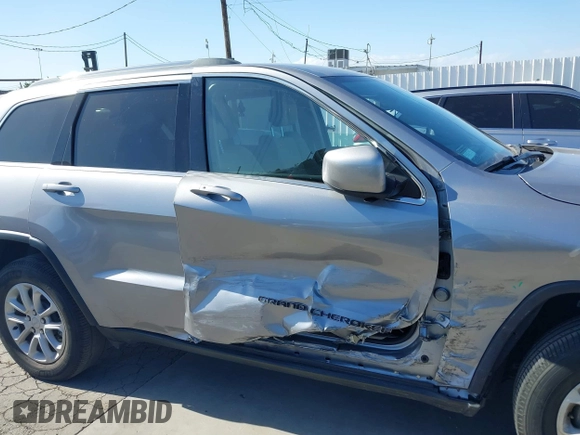 2021 Jeep Grand Cherokee Laredo E with VIN 1C4RJEAG6MC719089, listed as a IAAI auction lot 39290041 with 44,726 mi miles and . Bid and sale history available at DreamBid. Image 13.