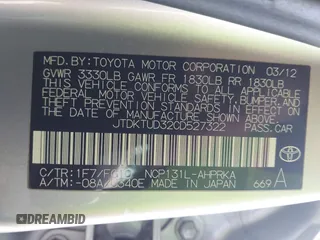 2012 Toyota Yaris L with VIN JTDKTUD32CD527322, listed as a IAAI auction lot 42053644 with 115,444 mi miles and . Bid and sale history available at carsss.com. Image 9.